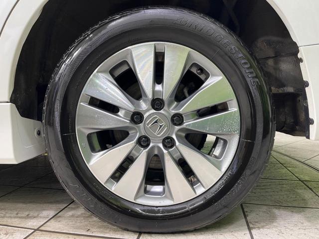 ステップワゴンスパーダ Ｚ　クールスピリット　４ＷＤ　純正９型ナビ　両側電動ドア　後席モニター　バックカメラ　寒冷地仕様　禁煙車　ハーフレザーシート　ドラレコ　スマートキー　ＨＩＤヘッド　ビルトインＥＴＣ　クルコン　純正１６インチアルミ（64枚目）