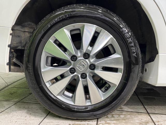 ステップワゴンスパーダ Ｚ　クールスピリット　４ＷＤ　純正９型ナビ　両側電動ドア　後席モニター　バックカメラ　寒冷地仕様　禁煙車　ハーフレザーシート　ドラレコ　スマートキー　ＨＩＤヘッド　ビルトインＥＴＣ　クルコン　純正１６インチアルミ（65枚目）