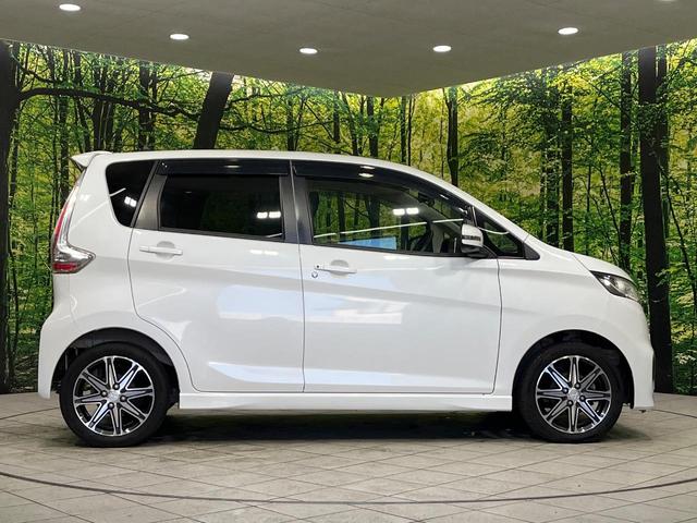 ｅＫカスタム Ｔセーフティプラスエディション　４ＷＤ　純正ナビ　全方位カメラ　衝突軽減ブレーキ　シートヒーター　スマートキー　ＨＩＤヘッド　ＥＴＣ　クルコン　純正１５インチアルミ　車線逸脱警報　オートエアコン　Ｂｌｕｅｔｏｏｔｈ　フルセグ（28枚目）