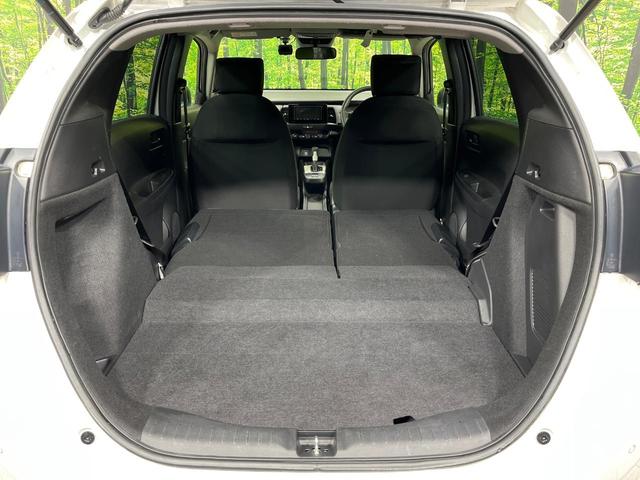 フィット ｅ：ＨＥＶベーシック　４ＷＤ　禁煙車　ＳＤナビ　Ｂｌｕｅｔｏｏｔｈ再生　バックカメラ　ホンダセンシング　アダプティブクルーズ　寒冷地仕様　ドライブレコーダー　ＬＥＤヘッド　ＥＴＣ　スマートキー　電子パーキングブレーキ（11枚目）