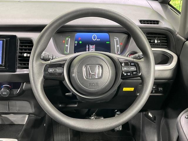 フィット ｅ：ＨＥＶベーシック　４ＷＤ　禁煙車　ＳＤナビ　Ｂｌｕｅｔｏｏｔｈ再生　バックカメラ　ホンダセンシング　アダプティブクルーズ　寒冷地仕様　ドライブレコーダー　ＬＥＤヘッド　ＥＴＣ　スマートキー　電子パーキングブレーキ（12枚目）