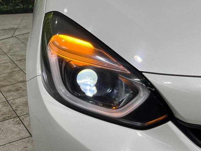 フィット ｅ：ＨＥＶベーシック　４ＷＤ　禁煙車　ＳＤナビ　Ｂｌｕｅｔｏｏｔｈ再生　バックカメラ　ホンダセンシング　アダプティブクルーズ　寒冷地仕様　ドライブレコーダー　ＬＥＤヘッド　ＥＴＣ　スマートキー　電子パーキングブレーキ（13枚目）