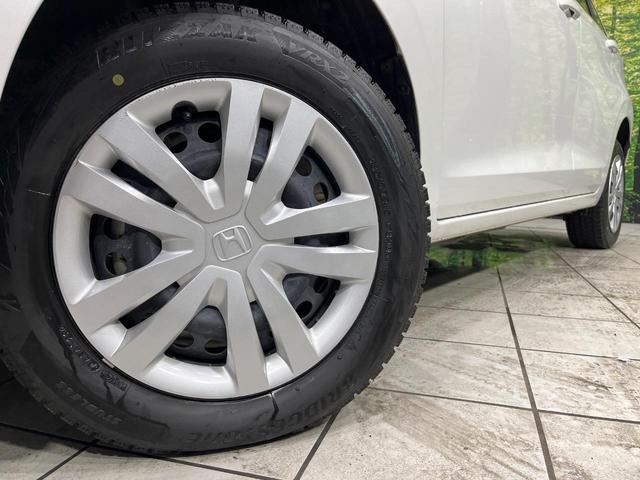 フィット ｅ：ＨＥＶベーシック　４ＷＤ　禁煙車　ＳＤナビ　Ｂｌｕｅｔｏｏｔｈ再生　バックカメラ　ホンダセンシング　アダプティブクルーズ　寒冷地仕様　ドライブレコーダー　ＬＥＤヘッド　ＥＴＣ　スマートキー　電子パーキングブレーキ（55枚目）