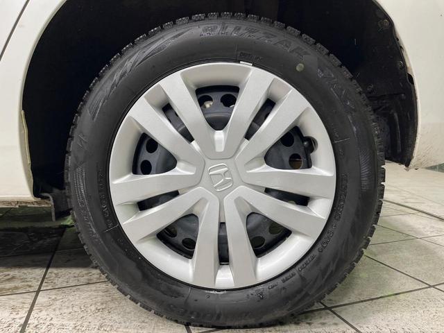 フィット ｅ：ＨＥＶベーシック　４ＷＤ　禁煙車　ＳＤナビ　Ｂｌｕｅｔｏｏｔｈ再生　バックカメラ　ホンダセンシング　アダプティブクルーズ　寒冷地仕様　ドライブレコーダー　ＬＥＤヘッド　ＥＴＣ　スマートキー　電子パーキングブレーキ（57枚目）