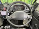 キャリイトラック ＫＣ　４ＷＤ　禁煙車　ＣＤ・ＤＶＤ再生　高低速２段階式５ＭＴ　サンバイザー（運転席／助手席）　エアバックセット（6枚目）