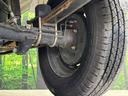 ＫＣ　４ＷＤ　禁煙車　ＣＤ・ＤＶＤ再生　高低速２段階式５ＭＴ　サンバイザー（運転席／助手席）　エアバックセット（16枚目）