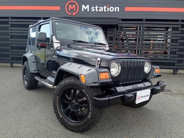 ジープ・ラングラー スポーツ　パートタイム４ＷＤ　ソフトトップ幌　オーバーフェンダー　ＥＴＣ　サイドステップ　ＫＭＣ１８インチＡＷ　ホワイトレタータイヤ　純正ＣＤオーディオ　オートマ（36枚目）