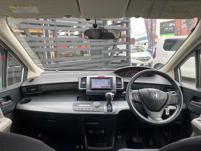 フリード Ｇ　エアロ　Ｌパッケージ　４ＷＤ　寒冷地仕様　社外ケンウッドナビ　フルセグＴＶ　バックカメラ　Ｂｌｕｅｔｏｏｔｈ　ＥＴＣ　パワースライドドア　ワイパーデアイサー　ヒ―テッドミラー　リアデフロスター　禁煙車（8枚目）