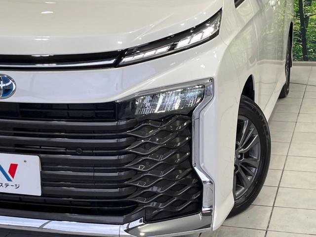 ヴォクシー ハイブリッドＳ－Ｇ　両側電動ドア　純正１０型ナビ　バックカメラ　衝突軽減装置　レーダークルーズ　禁煙車　コーナーセンサー　レーンキープ　ＬＥＤヘッド　ＥＴＣ２．０　オートハイビーム　誤発進抑制機能　先行車発進告知（13枚目）
