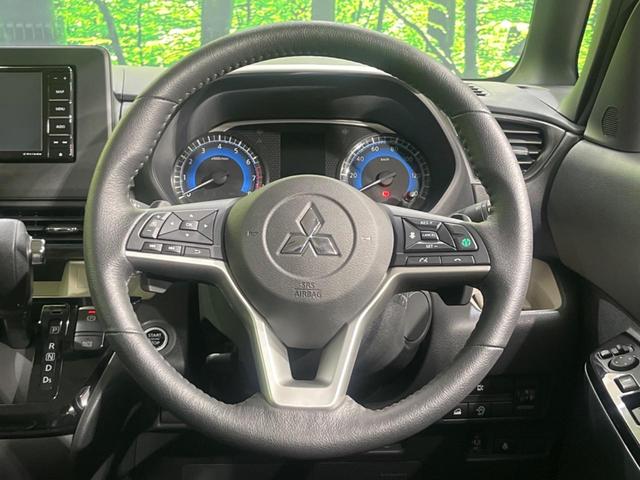 デリカミニ T プレミアム 4WD ターボ 両側電動ドア SDナビ バックカメラ 衝突軽減装置 レーダークルーズ 禁煙車 ハーフレザーシート 前後ドラレコ ETC コーナーセンサー LEDヘッド&フォグ ステアリングヒーター(11枚目)