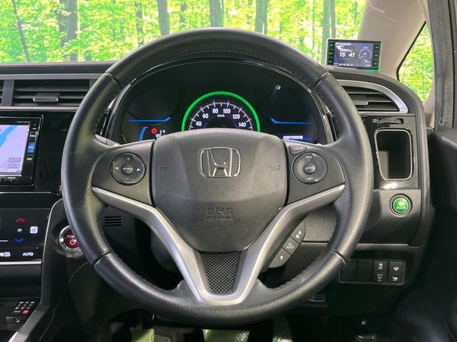 シャトル ハイブリッドＺ　純正ナビ　バックカメラ　衝突軽減装置　禁煙車　ハーフレザーシート　ドラレコ　コーナーセンサー　シートヒーター　スマートキー　ＬＥＤヘッド　ＥＴＣ　クルコン　フルセグ　オートライト　デュアルエアコン（11枚目）