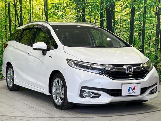 シャトル ハイブリッドＺ　純正ナビ　バックカメラ　衝突軽減装置　禁煙車　ハーフレザーシート　ドラレコ　コーナーセンサー　シートヒーター　スマートキー　ＬＥＤヘッド　ＥＴＣ　クルコン　フルセグ　オートライト　デュアルエアコン（16枚目）