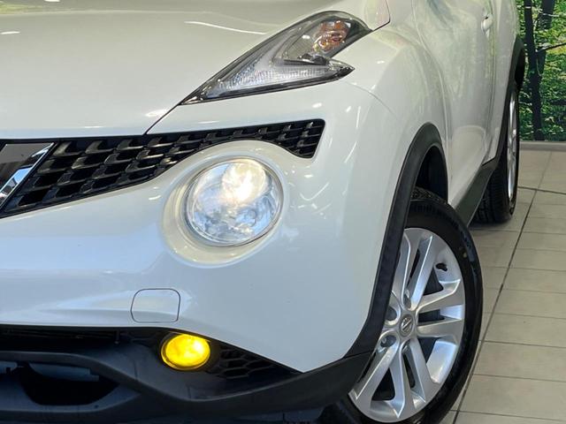ジューク 15RX Vセレクション 純正ナビ 全周囲カメラ 衝突軽減装置 禁煙車 ドラレコ スマートキー HIDヘッド ETC 車線逸脱警報 オートライト オートエアコン Bluetooth CD DVD再生 フルセグ 純正AW(12枚目)