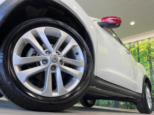 ジューク 15RX Vセレクション 純正ナビ 全周囲カメラ 衝突軽減装置 禁煙車 ドラレコ スマートキー HIDヘッド ETC 車線逸脱警報 オートライト オートエアコン Bluetooth CD DVD再生 フルセグ 純正AW(13枚目)