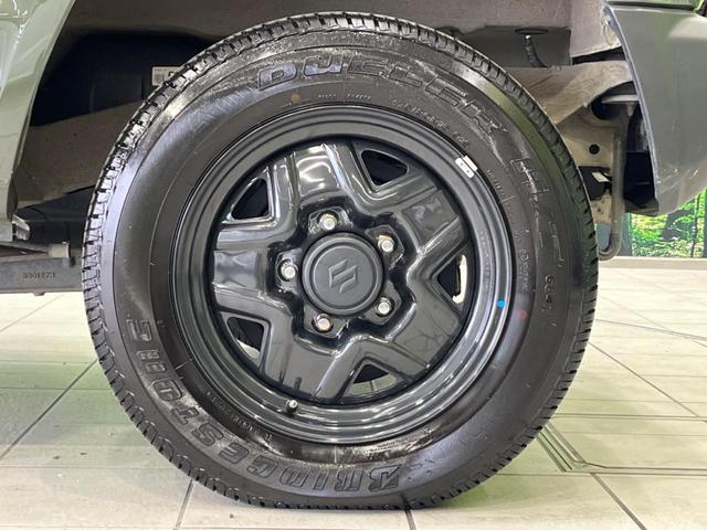 ジムニー XG 4WD 5MT ターボ SDナビ 禁煙車 ドラレコ Bluetooth AM FM再生 ドアバイザー プライバシーガラス 横滑り防止装置 盗難防止装置 エアバック(運転席 助手席 サイド カーテン)(56枚目)