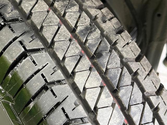 ジムニー XG 4WD 5MT ターボ SDナビ 禁煙車 ドラレコ Bluetooth AM FM再生 ドアバイザー プライバシーガラス 横滑り防止装置 盗難防止装置 エアバック(運転席 助手席 サイド カーテン)(57枚目)