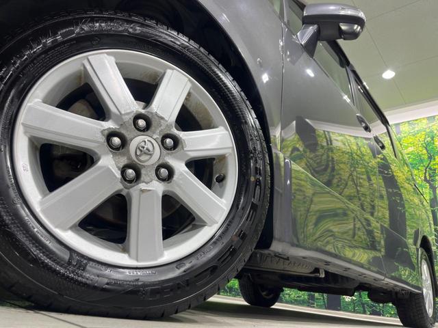 ノア Si 電動スライドドア 純正ナビ バックカメラ 後席モニター 禁煙車 スマートキー HIDヘッド ETC オートエアコン 純正16インチAW CD/DVD再生 フルセグ ステアリングスイッチ パドルシフト(14枚目)