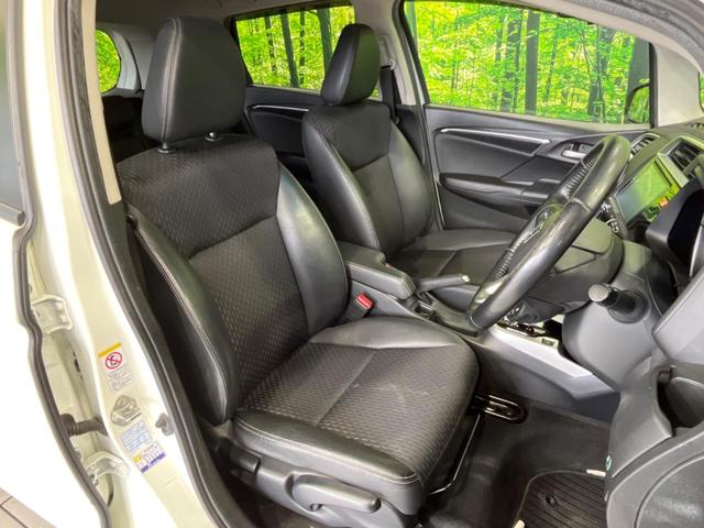 フィットハイブリッド Ｌパッケージ　純正ナビ　バックカメラ　衝突軽減装置　禁煙車　ハーフレザーシート　スマートキー　ＬＥＤヘッド　ＥＴＣ　クルコン　誤発進抑制機能　オートライト　オートエアコン　Ｂｌｕｅｔｏｏｔｈ　ＣＤ　ＤＶＤ再生（8枚目）