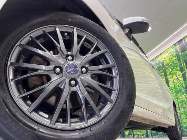 フィットハイブリッド Ｌパッケージ　純正ナビ　バックカメラ　衝突軽減装置　禁煙車　ハーフレザーシート　スマートキー　ＬＥＤヘッド　ＥＴＣ　クルコン　誤発進抑制機能　オートライト　オートエアコン　Ｂｌｕｅｔｏｏｔｈ　ＣＤ　ＤＶＤ再生（13枚目）