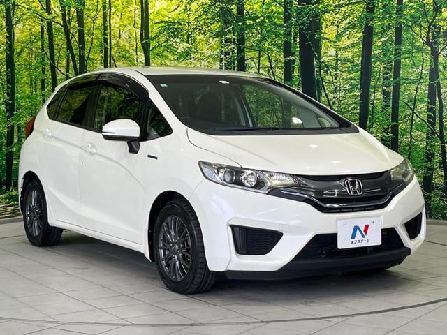 フィットハイブリッド Ｌパッケージ　純正ナビ　バックカメラ　衝突軽減装置　禁煙車　ハーフレザーシート　スマートキー　ＬＥＤヘッド　ＥＴＣ　クルコン　誤発進抑制機能　オートライト　オートエアコン　Ｂｌｕｅｔｏｏｔｈ　ＣＤ　ＤＶＤ再生（16枚目）