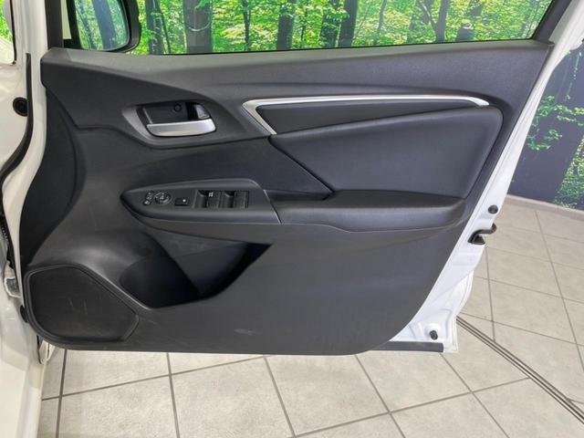 フィットハイブリッド Ｌパッケージ　純正ナビ　バックカメラ　衝突軽減装置　禁煙車　ハーフレザーシート　スマートキー　ＬＥＤヘッド　ＥＴＣ　クルコン　誤発進抑制機能　オートライト　オートエアコン　Ｂｌｕｅｔｏｏｔｈ　ＣＤ　ＤＶＤ再生（60枚目）