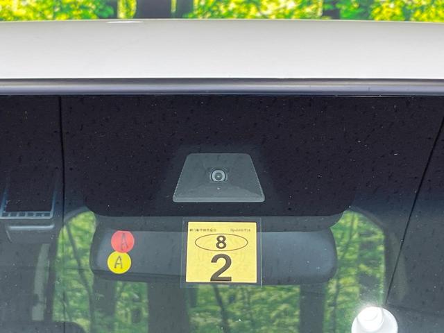 N-BOXカスタム Lターボ スタイル+ブラック 両側電動ドア 純正9型ナビ バックカメラ 衝突軽減装置 レーダークルーズ 禁煙車 ハーフレザーシート コーナーセンサー スマートキー LEDヘッド ETC オートハイビーム オートエアコン 純正AW(6枚目)