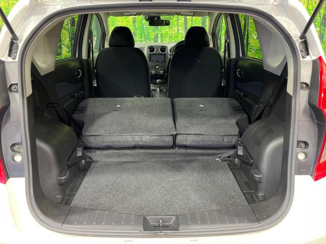ノート Ｘ　Ｖセレクション＋セーフティ　ＳＤナビ　衝突軽減装置　禁煙車　スマートキー　ＥＴＣ　車線逸脱警報　誤発進抑制機能　ＣＤ　ＤＶＤ再生　地デジ　アイドリングストップ　横滑り防止装置　プライバシーガラス　電動格納ミラー　盗難防止装置（10枚目）