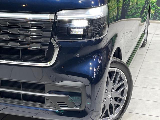 N-BOXカスタム ターボ 両側電動ドア 全周囲カメラ 衝突軽減装置 レーダークルーズ 禁煙車 ハーフレザーシート コーナーセンサー レーンキープ スマートキー LEDヘッド ETC オートハイビーム 純正15インチAW(12枚目)