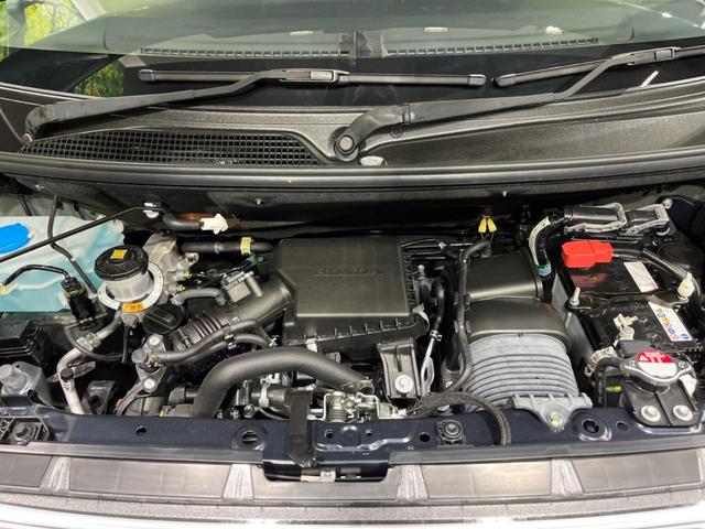 N-BOXカスタム ターボ 両側電動ドア 全周囲カメラ 衝突軽減装置 レーダークルーズ 禁煙車 ハーフレザーシート コーナーセンサー レーンキープ スマートキー LEDヘッド ETC オートハイビーム 純正15インチAW(18枚目)