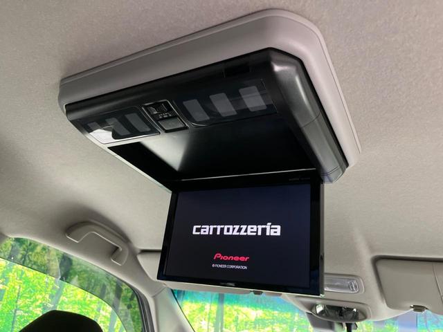 フリード G・ホンダセンシング 両側電動ドア 純正9型ナビ 後席モニター バックカメラ 寒冷地仕様 衝突軽減装置 レーダークルーズ 禁煙車 レーンキープ スマートキー LEDヘッド ETC 誤発進抑制機能 先行車発進告知 DVD再生(6枚目)