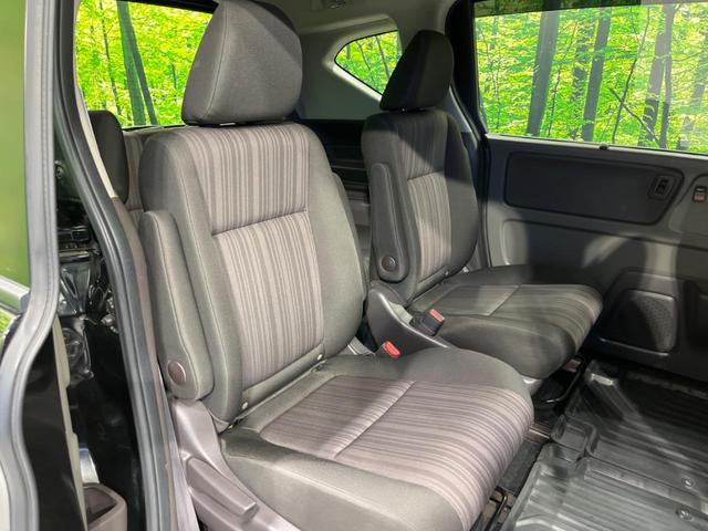 フリード G・ホンダセンシング 両側電動ドア 純正9型ナビ 後席モニター バックカメラ 寒冷地仕様 衝突軽減装置 レーダークルーズ 禁煙車 レーンキープ スマートキー LEDヘッド ETC 誤発進抑制機能 先行車発進告知 DVD再生(9枚目)