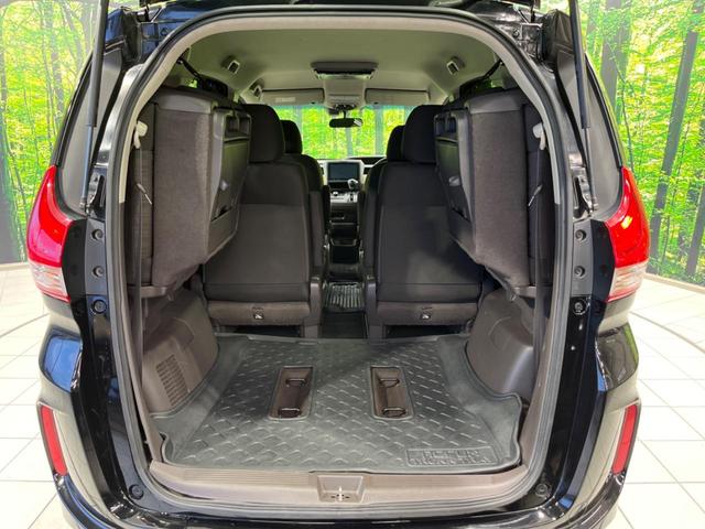 フリード G・ホンダセンシング 両側電動ドア 純正9型ナビ 後席モニター バックカメラ 寒冷地仕様 衝突軽減装置 レーダークルーズ 禁煙車 レーンキープ スマートキー LEDヘッド ETC 誤発進抑制機能 先行車発進告知 DVD再生(11枚目)