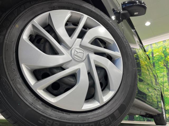 フリード G・ホンダセンシング 両側電動ドア 純正9型ナビ 後席モニター バックカメラ 寒冷地仕様 衝突軽減装置 レーダークルーズ 禁煙車 レーンキープ スマートキー LEDヘッド ETC 誤発進抑制機能 先行車発進告知 DVD再生(14枚目)