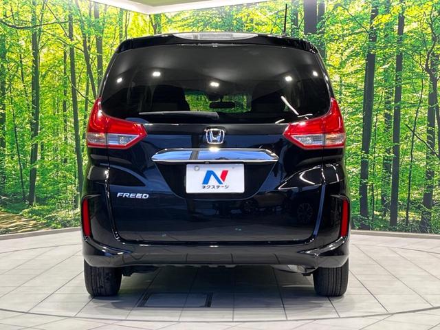 フリード G・ホンダセンシング 両側電動ドア 純正9型ナビ 後席モニター バックカメラ 寒冷地仕様 衝突軽減装置 レーダークルーズ 禁煙車 レーンキープ スマートキー LEDヘッド ETC 誤発進抑制機能 先行車発進告知 DVD再生(16枚目)