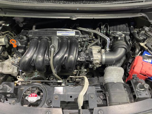 フリード G・ホンダセンシング 両側電動ドア 純正9型ナビ 後席モニター バックカメラ 寒冷地仕様 衝突軽減装置 レーダークルーズ 禁煙車 レーンキープ スマートキー LEDヘッド ETC 誤発進抑制機能 先行車発進告知 DVD再生(18枚目)