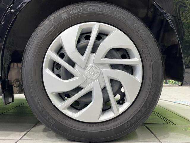 フリード G・ホンダセンシング 両側電動ドア 純正9型ナビ 後席モニター バックカメラ 寒冷地仕様 衝突軽減装置 レーダークルーズ 禁煙車 レーンキープ スマートキー LEDヘッド ETC 誤発進抑制機能 先行車発進告知 DVD再生(24枚目)