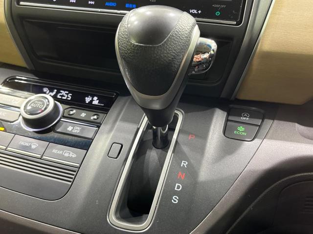 フリード G・ホンダセンシング 両側電動ドア 純正9型ナビ 後席モニター バックカメラ 寒冷地仕様 衝突軽減装置 レーダークルーズ 禁煙車 レーンキープ スマートキー LEDヘッド ETC 誤発進抑制機能 先行車発進告知 DVD再生(33枚目)