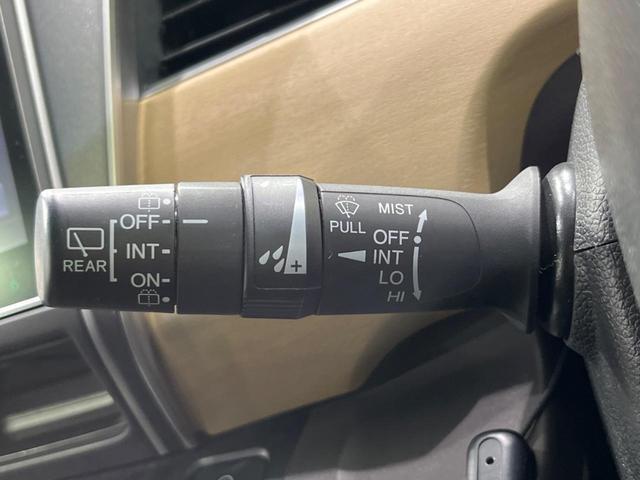 フリード G・ホンダセンシング 両側電動ドア 純正9型ナビ 後席モニター バックカメラ 寒冷地仕様 衝突軽減装置 レーダークルーズ 禁煙車 レーンキープ スマートキー LEDヘッド ETC 誤発進抑制機能 先行車発進告知 DVD再生(34枚目)