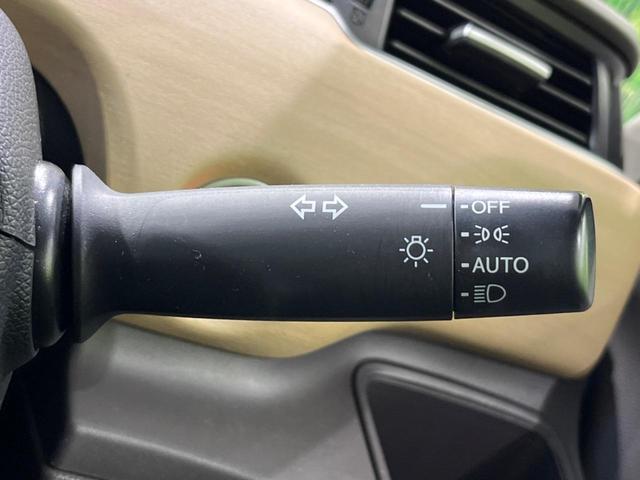 フリード G・ホンダセンシング 両側電動ドア 純正9型ナビ 後席モニター バックカメラ 寒冷地仕様 衝突軽減装置 レーダークルーズ 禁煙車 レーンキープ スマートキー LEDヘッド ETC 誤発進抑制機能 先行車発進告知 DVD再生(35枚目)