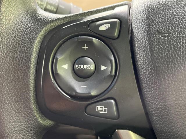 フリード G・ホンダセンシング 両側電動ドア 純正9型ナビ 後席モニター バックカメラ 寒冷地仕様 衝突軽減装置 レーダークルーズ 禁煙車 レーンキープ スマートキー LEDヘッド ETC 誤発進抑制機能 先行車発進告知 DVD再生(36枚目)