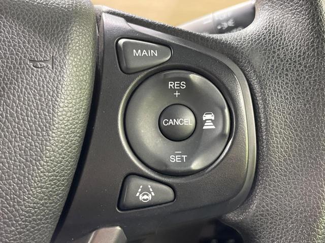 フリード G・ホンダセンシング 両側電動ドア 純正9型ナビ 後席モニター バックカメラ 寒冷地仕様 衝突軽減装置 レーダークルーズ 禁煙車 レーンキープ スマートキー LEDヘッド ETC 誤発進抑制機能 先行車発進告知 DVD再生(37枚目)