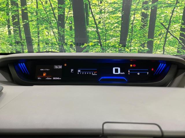 フリード G・ホンダセンシング 両側電動ドア 純正9型ナビ 後席モニター バックカメラ 寒冷地仕様 衝突軽減装置 レーダークルーズ 禁煙車 レーンキープ スマートキー LEDヘッド ETC 誤発進抑制機能 先行車発進告知 DVD再生(40枚目)