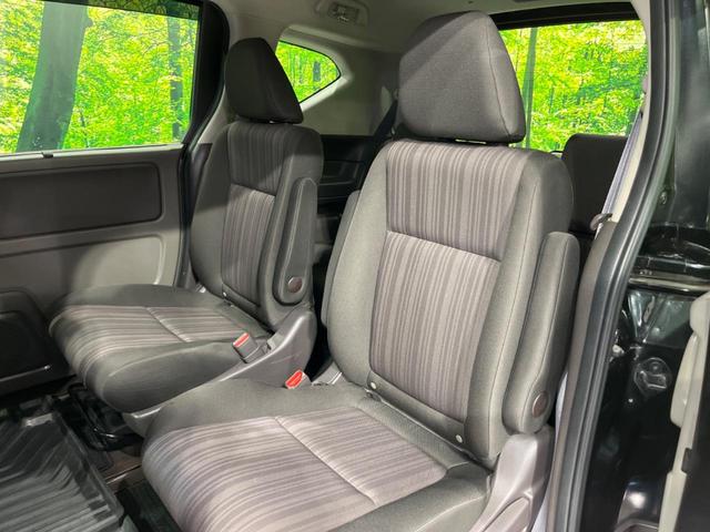 フリード G・ホンダセンシング 両側電動ドア 純正9型ナビ 後席モニター バックカメラ 寒冷地仕様 衝突軽減装置 レーダークルーズ 禁煙車 レーンキープ スマートキー LEDヘッド ETC 誤発進抑制機能 先行車発進告知 DVD再生(55枚目)