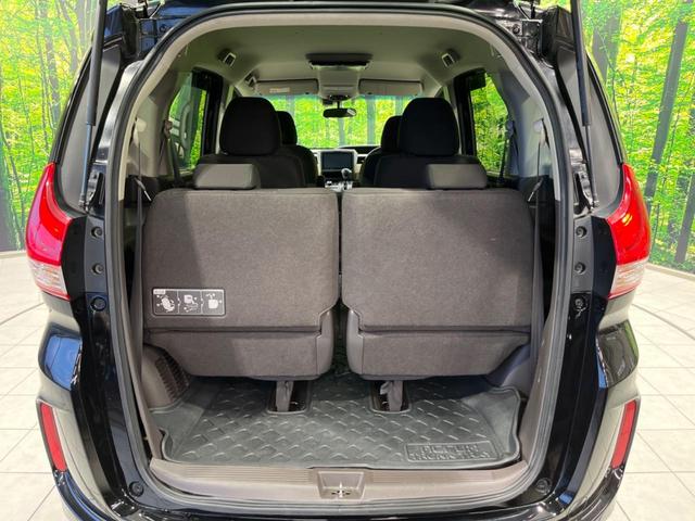 フリード G・ホンダセンシング 両側電動ドア 純正9型ナビ 後席モニター バックカメラ 寒冷地仕様 衝突軽減装置 レーダークルーズ 禁煙車 レーンキープ スマートキー LEDヘッド ETC 誤発進抑制機能 先行車発進告知 DVD再生(59枚目)