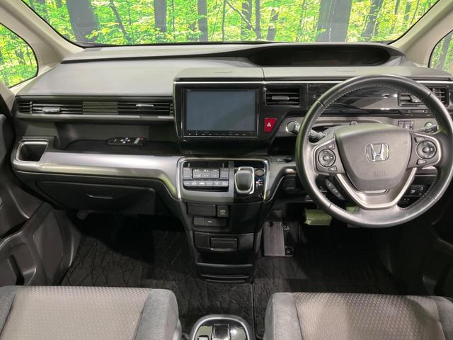 ステップワゴンスパーダ スパーダハイブリッド G ホンダセンシング 両側電動ドア 後席モニター 純正9型ナビ 全周囲カメラ アダプティブクルーズ 禁煙車 ドラレコ ETC スマートキー LEDヘッド 車線逸脱警報 誤発信抑制機能 先行車発進告知 CD DVD再生(2枚目)