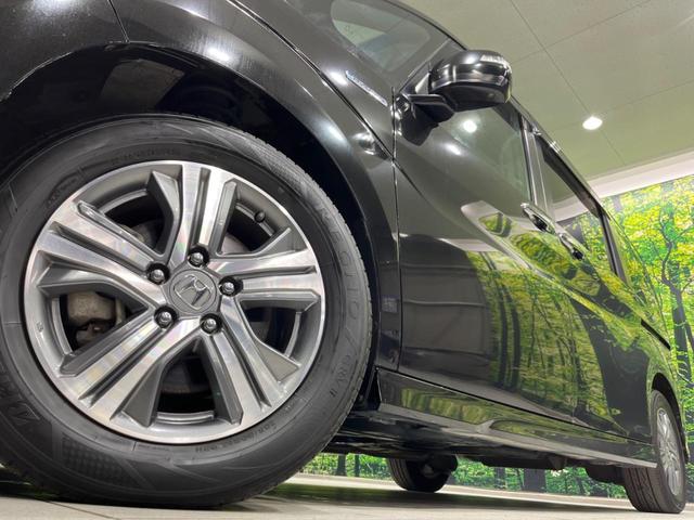 ステップワゴンスパーダ スパーダハイブリッド G ホンダセンシング 両側電動ドア 後席モニター 純正9型ナビ 全周囲カメラ アダプティブクルーズ 禁煙車 ドラレコ ETC スマートキー LEDヘッド 車線逸脱警報 誤発信抑制機能 先行車発進告知 CD DVD再生(14枚目)