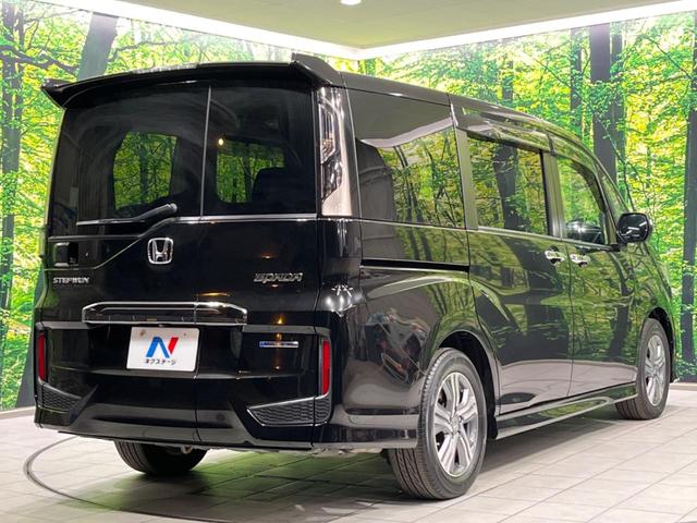 ステップワゴンスパーダ スパーダハイブリッド G ホンダセンシング 両側電動ドア 後席モニター 純正9型ナビ 全周囲カメラ アダプティブクルーズ 禁煙車 ドラレコ ETC スマートキー LEDヘッド 車線逸脱警報 誤発信抑制機能 先行車発進告知 CD DVD再生(17枚目)