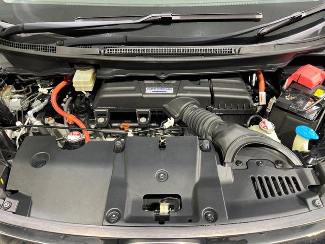 ステップワゴンスパーダ スパーダハイブリッド G ホンダセンシング 両側電動ドア 後席モニター 純正9型ナビ 全周囲カメラ アダプティブクルーズ 禁煙車 ドラレコ ETC スマートキー LEDヘッド 車線逸脱警報 誤発信抑制機能 先行車発進告知 CD DVD再生(18枚目)