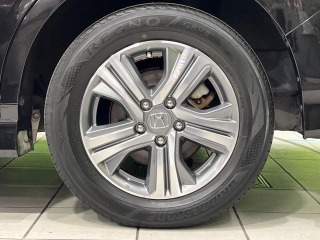 ステップワゴンスパーダ スパーダハイブリッド G ホンダセンシング 両側電動ドア 後席モニター 純正9型ナビ 全周囲カメラ アダプティブクルーズ 禁煙車 ドラレコ ETC スマートキー LEDヘッド 車線逸脱警報 誤発信抑制機能 先行車発進告知 CD DVD再生(24枚目)