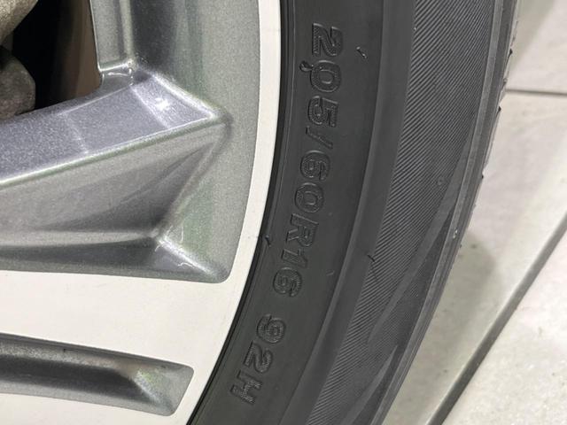 ステップワゴンスパーダ スパーダハイブリッド G ホンダセンシング 両側電動ドア 後席モニター 純正9型ナビ 全周囲カメラ アダプティブクルーズ 禁煙車 ドラレコ ETC スマートキー LEDヘッド 車線逸脱警報 誤発信抑制機能 先行車発進告知 CD DVD再生(26枚目)